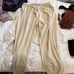 Large, Long sweat pants. Very comfy but large